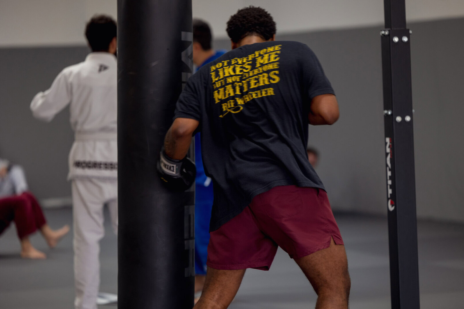 Man hitting the heavy punching bag