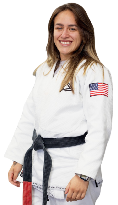 Photo of BJJ and Muay Thai instructor Ana Carolina Campos in Jiu Jitsu gi